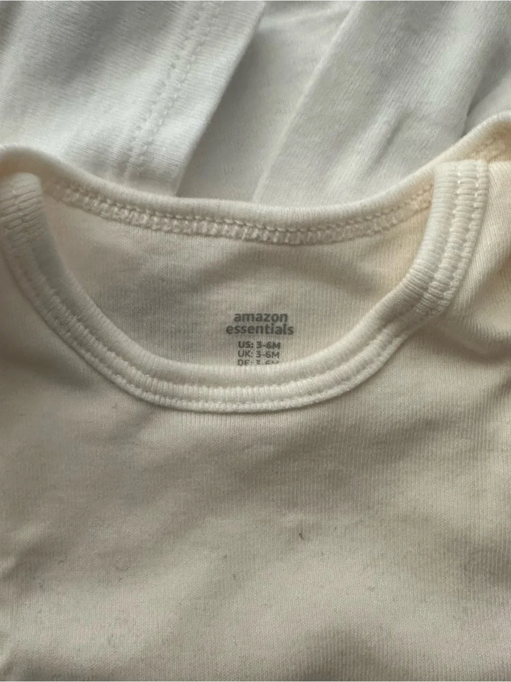 5 Pack White & Cream Baby Bodysuits